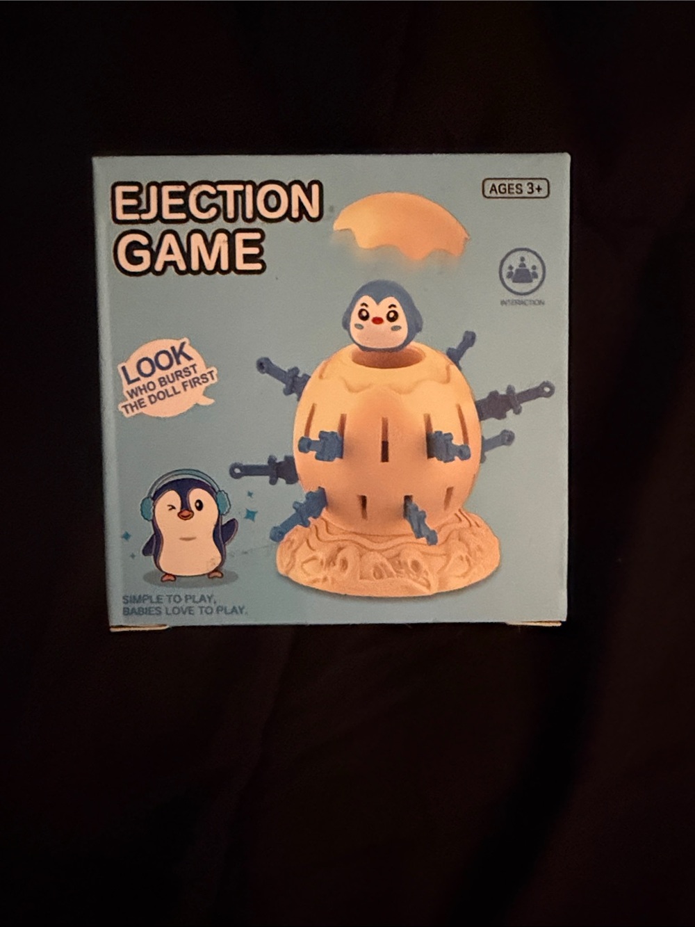 Penguin Egg Push-Insert Game - Blue Box